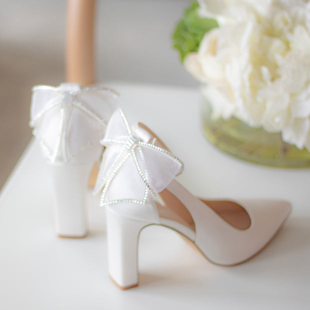 Ivory bow deals heels